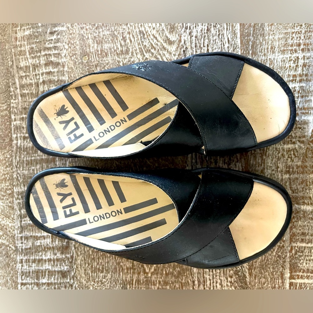 Fly London platforms in black leather. Size 8 fits 8.5.
